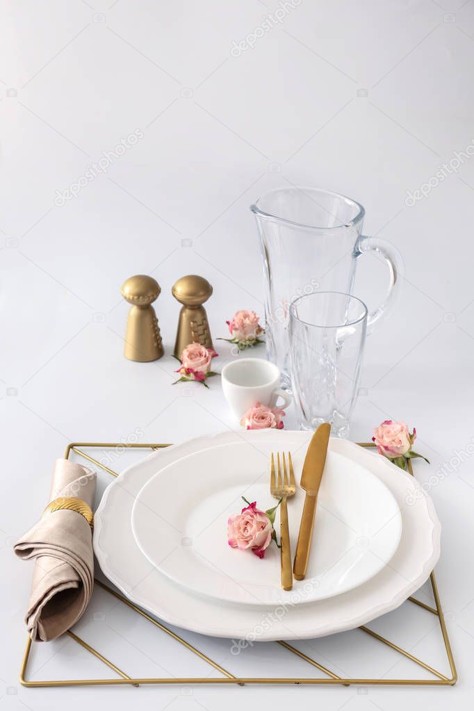 Beautiful table setting on light background