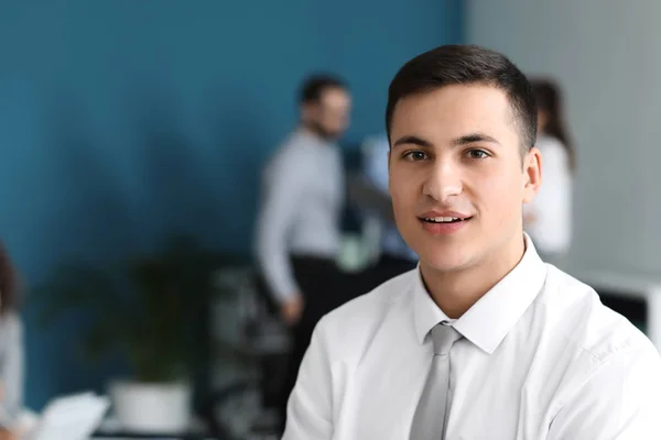 Young businessman at meeting in office — Stock Photo, Image