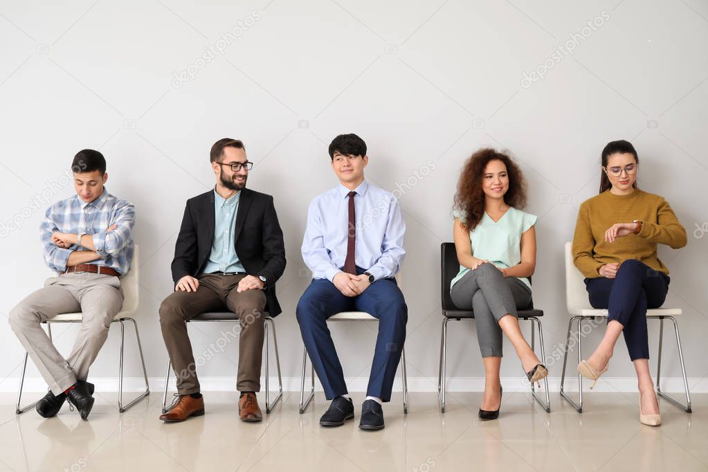 Young people waiting for job interview indoors