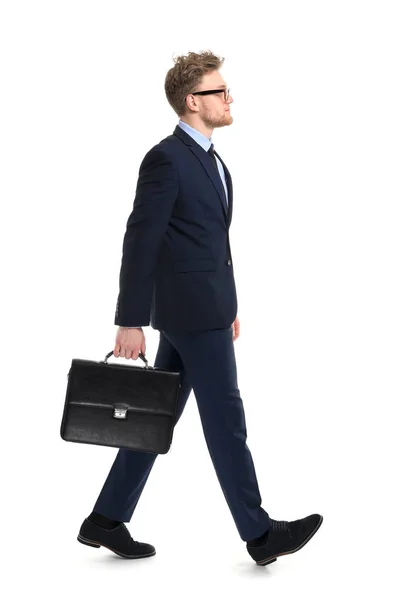 Going businessman with stylish briefcase on white background — Stock Photo, Image