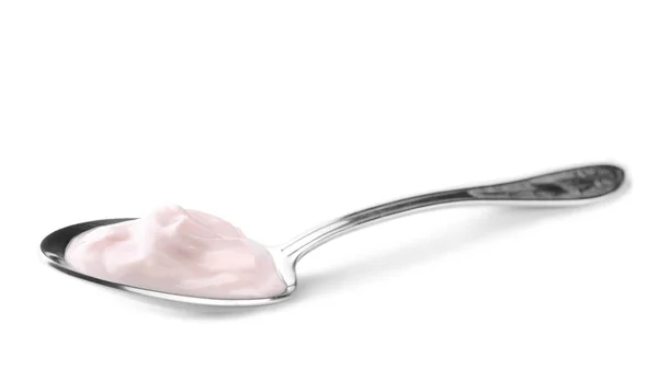 Colher com iogurte saboroso no fundo branco — Fotografia de Stock