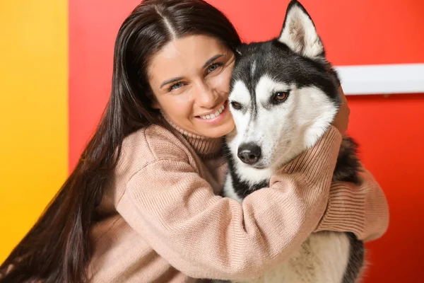 Portrait of young woman with her cute husky dog — Stock Photo, Image