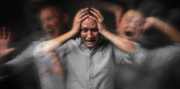 Man having panic attack on dark background — Stock Photo, Image