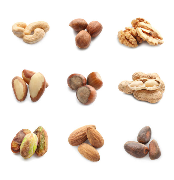 Ассортимент вкусных орехов на белом фоне
