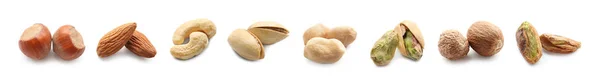 Assortment of tasty nuts on white background — Stock Photo, Image