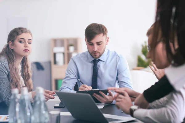 Young people having business meeting in office — Stock Photo, Image