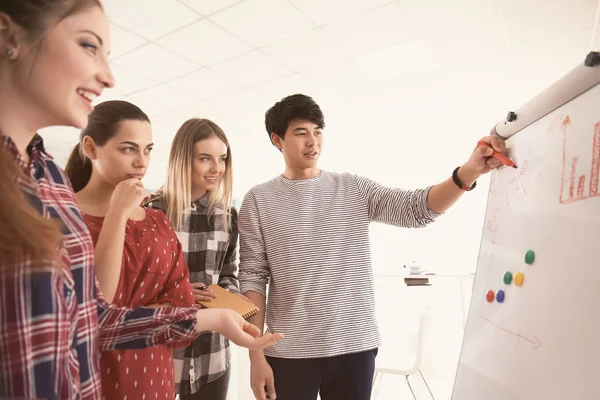 Young man holding business meeting in office — Stock Photo, Image