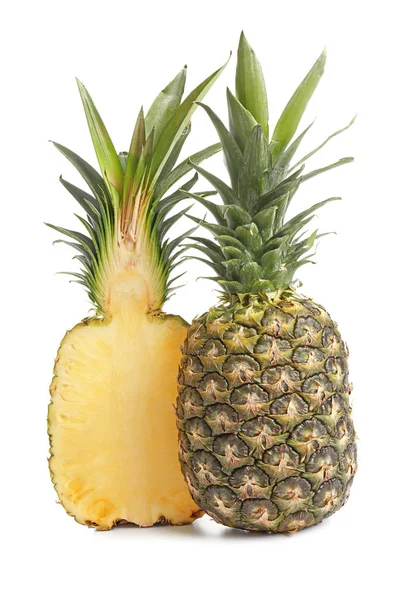 Half of ripe pineapple and whole fruit on white background — Stock Photo, Image