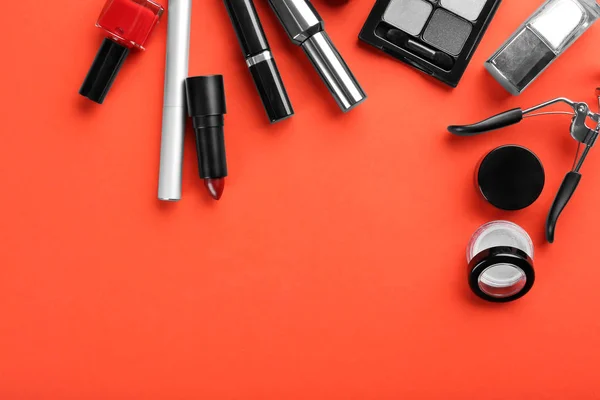Flat lay composition with decorative cosmetics on color background — Stock Photo, Image