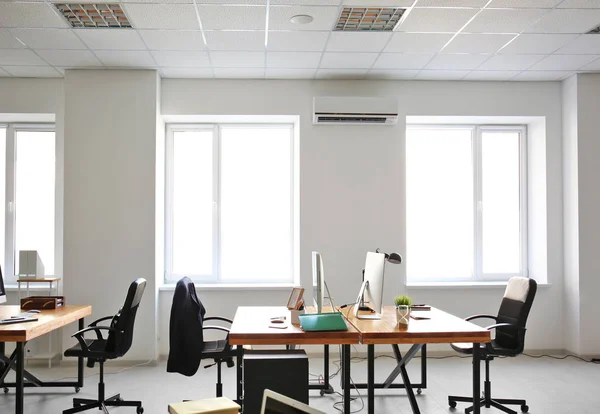 Office interior with tables and armchairs. Workplace design — Stock Photo, Image