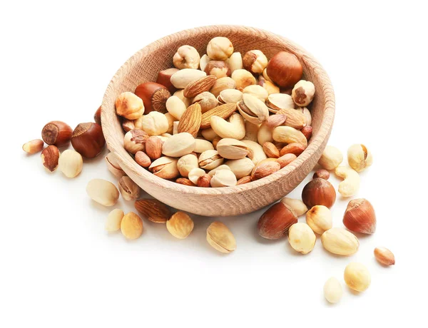 Different nuts in bowl on white background — Stock Photo, Image