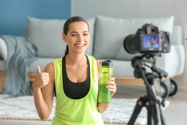 Young female blogger recording sports video at home — Stock Photo, Image