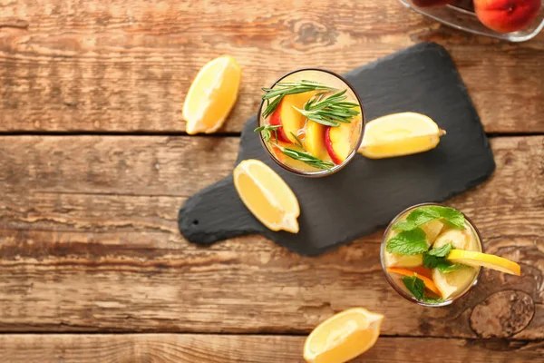 Fresh summer cocktail in glasses on wooden table — Stock Photo, Image