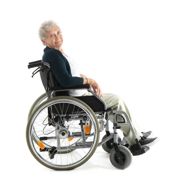 Senior woman in wheelchair on white background — Stock Photo, Image