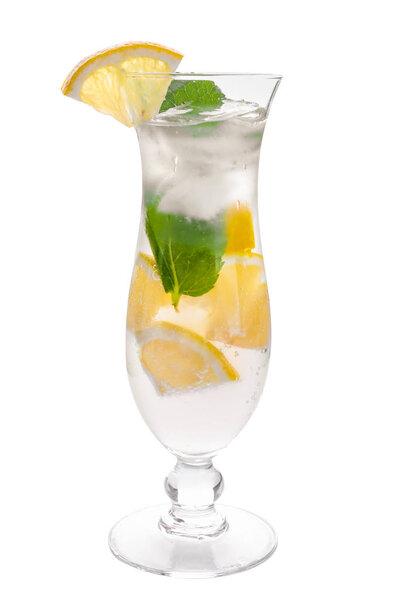 Glass of fresh lemonade on white background