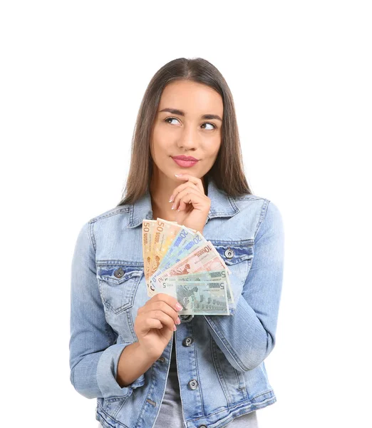 Przemyślane, młoda kobieta z pieniędzy na białym tle — Zdjęcie stockowe