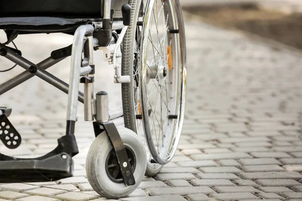 Empty modern wheelchair outdoors — Stock Photo, Image
