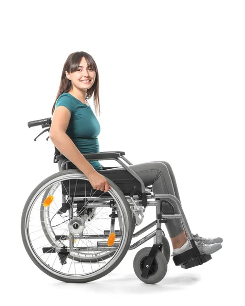 Szczęśliwa młoda kobieta na wózku inwalidzkim na białym tle — Zdjęcie stockowe