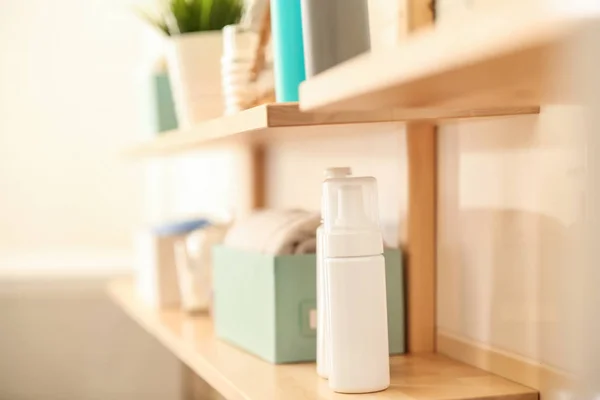 Body care accessories on shelf in bathroom — Stock Photo, Image
