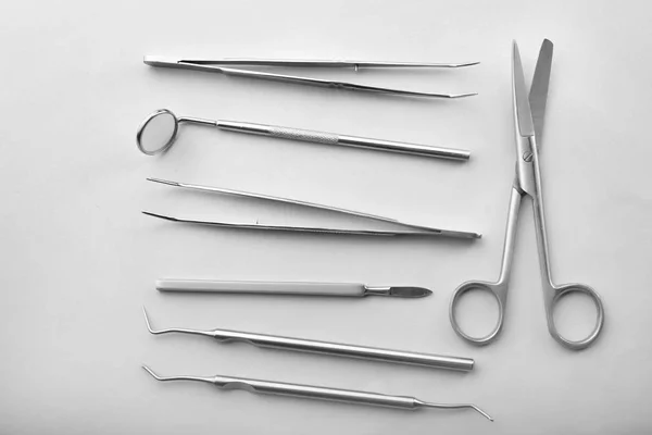 Dentist's tools on light background — Stock Photo, Image