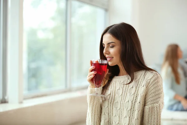 Woman with delicious mulled wine at home — Stock Photo, Image