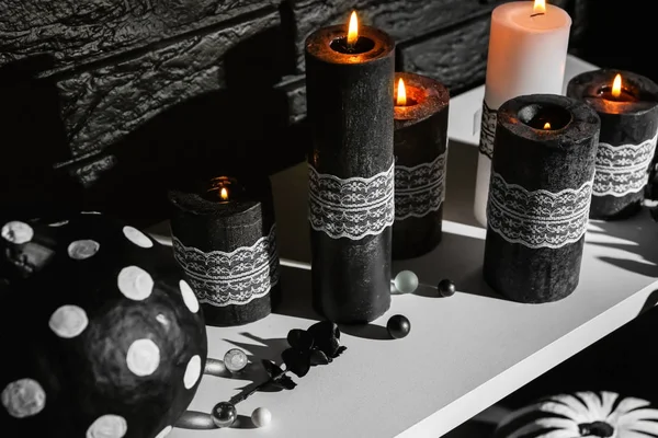 Burning candles for Halloween party on table — Stock Photo, Image