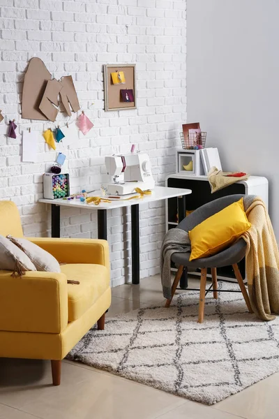 Stylish tailor's workplace in interior of workshop — Stock Photo, Image