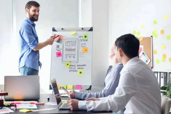 Young IT designers working in office — Stock Photo, Image