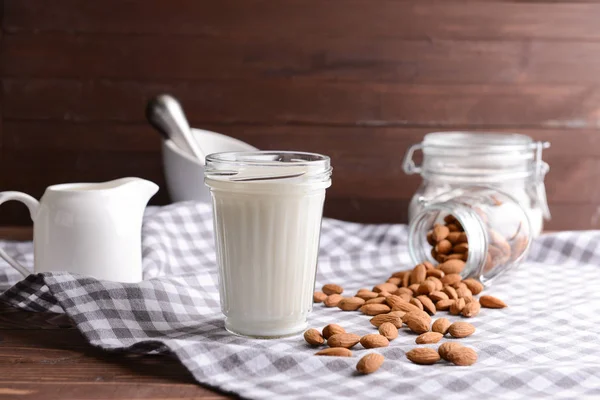 Glass of healthy almond milk on table — Stock Photo, Image