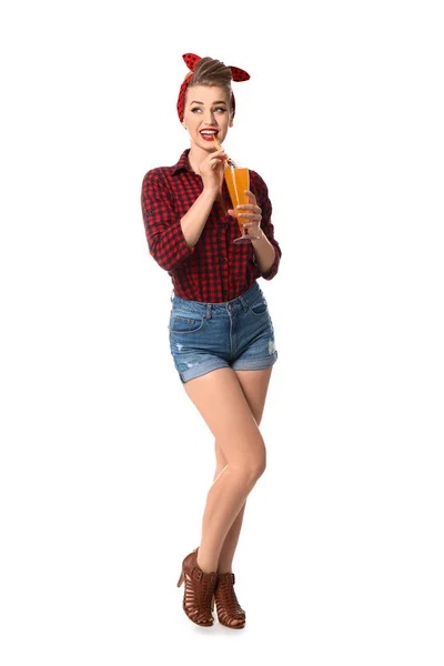 Beautiful pin-up woman with cocktail on white background — Stock Photo, Image