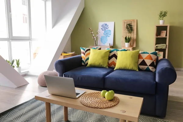 Interior of modern room with comfortable sofa and table — Stock Photo, Image