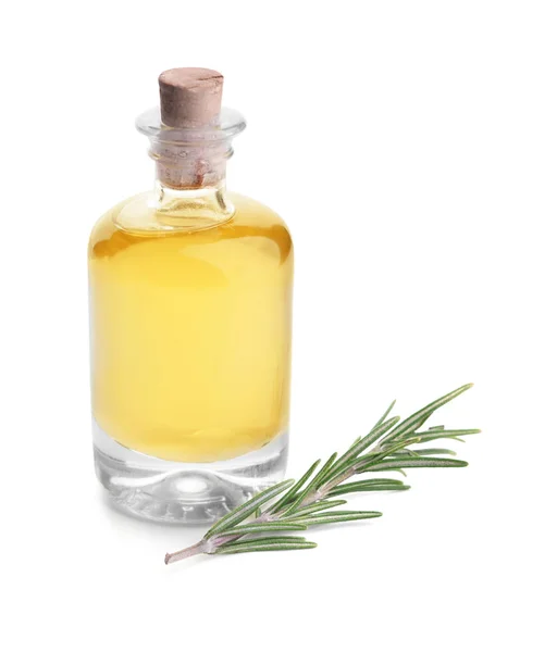 Bottle with rosemary oil on white background — Stock Photo, Image
