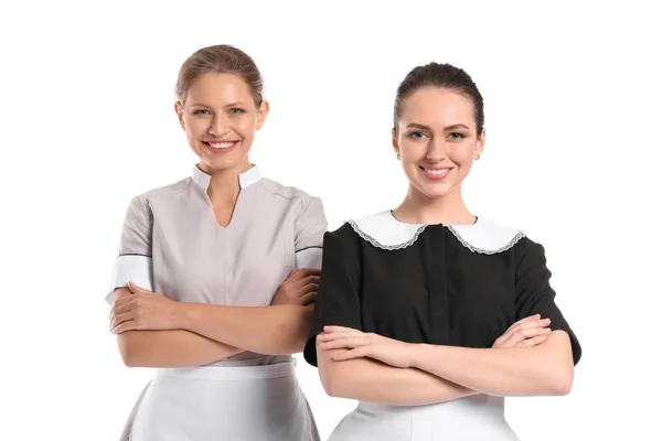 Portrait of beautiful female housekeepers on white background — Stock Photo, Image