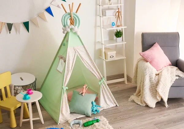 Cozy play tent for kids in interior of room — Stock Photo, Image