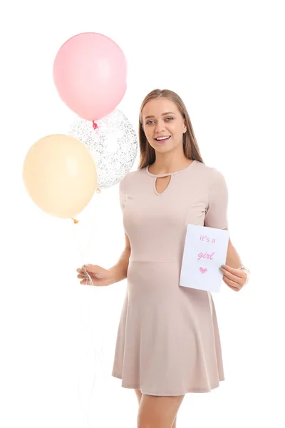 Femeie gravidă frumoasă care deține baloane de aer și carte cu text Este o fată pe fundal alb — Fotografie, imagine de stoc