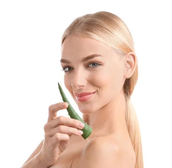 Beautiful young woman with aloe vera on white background — Stock Photo, Image