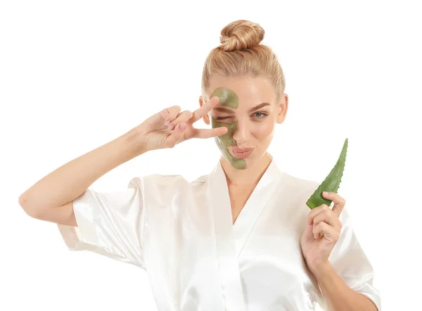 Beautiful young woman with facial mask containing aloe vera extract, on white background — Stock Photo, Image