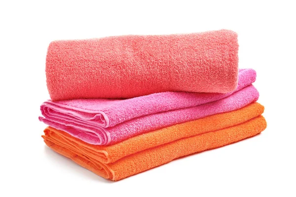 Stack of bright towels on white background — Stock Photo, Image
