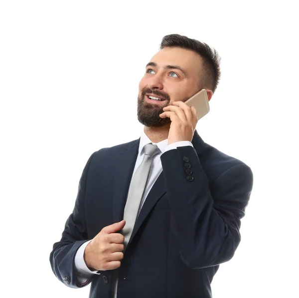 Bonito homem de negócios falando por telefone no fundo branco — Fotografia de Stock