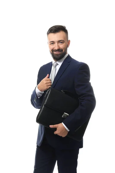 Stilig affärsman med säck på vit bakgrund — Stockfoto