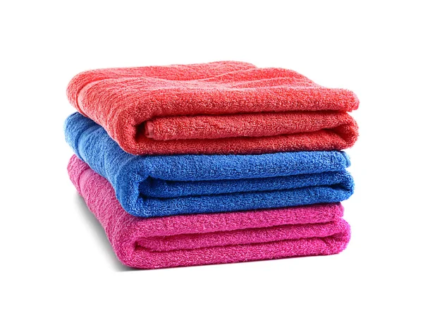 Stack of bright soft towels on white background — Stock Photo, Image