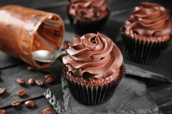 Delicious chocolate cupcake on slate plate — Stock Photo, Image