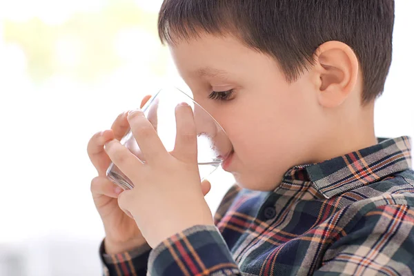 Little boy drinking fresh water — Stock Photo, Image