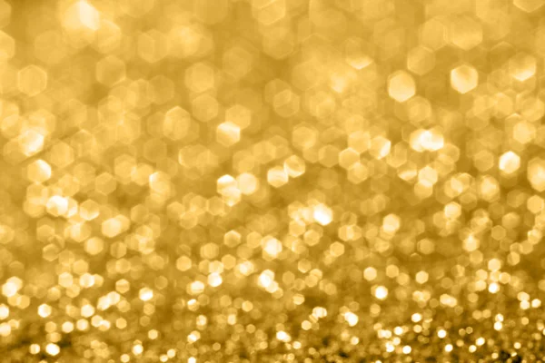Vista turva de brilho dourado brilhante — Fotografia de Stock