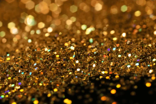Glanzende gouden glitter, close-up — Stockfoto