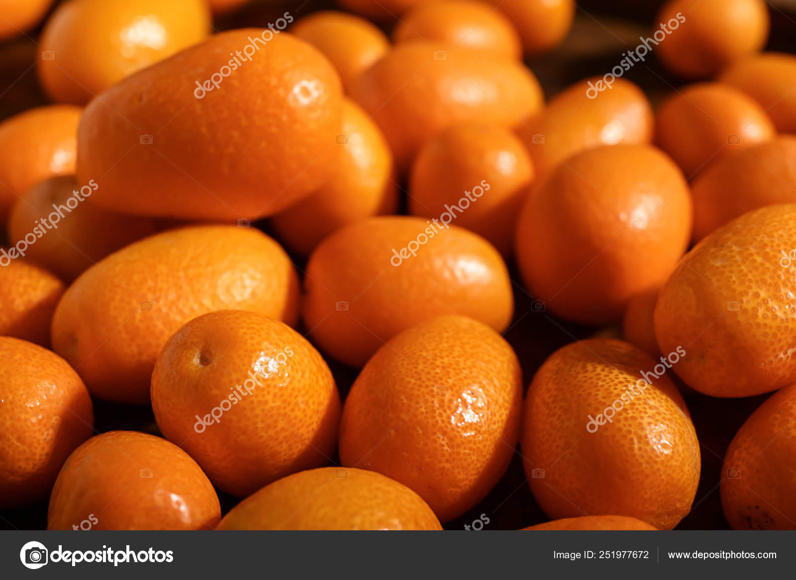 Delicious kumquat fruit, closeup Stock Photo by ©serezniy 251977672