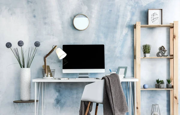 Stylish workplace with modern computer in interior of room — Stock Photo, Image