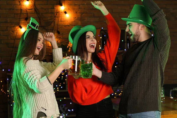 Young people celebrating St. Patrick\'s Day in pub