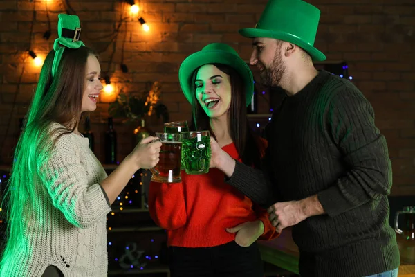 Young people celebrating St. Patrick\'s Day in pub