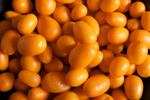 Delizioso frutto kumquat come sfondo — Foto Stock